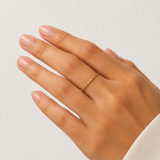 Woman's 18K Gold 1mm Band Ring